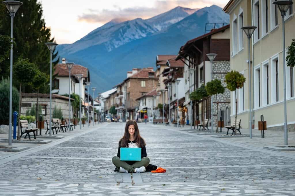 Woman traveling with a laptop